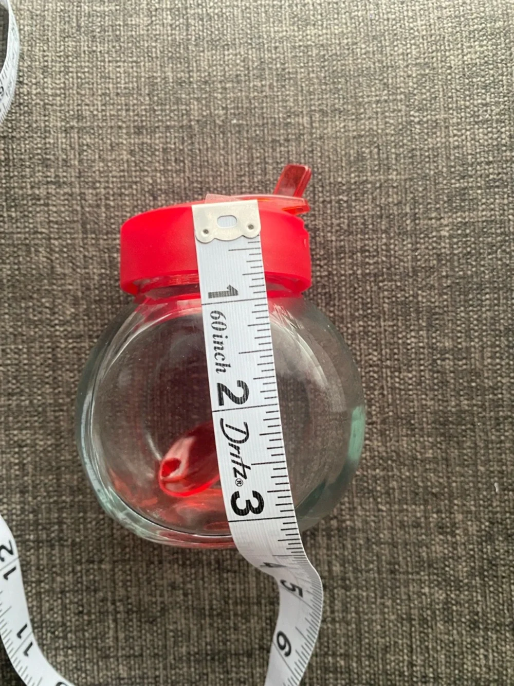 Clear Glass Honey Jar with Red Lid and Spoon